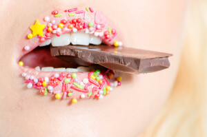 dreamstimeextrasmall 30966320 300x199 - http://www.dreamstime.com/stock-photo-sweet-lips-chocolate-bar-candy-colorful-closeup-image30966320
