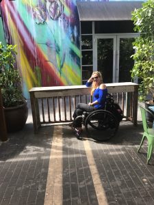 Woman in wheelchair at Wynwood Wall Art e1561001459899 225x300 - Woman in wheelchair at Wynwood Wall Art