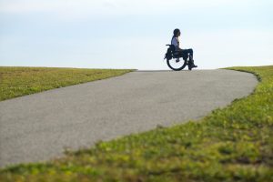 PL BGNU48P original 300x200 - Woman in a wheelchair on a country hilltop. (Photo Copyright 2014 David Binder from PUSHLivingPhotos.com)